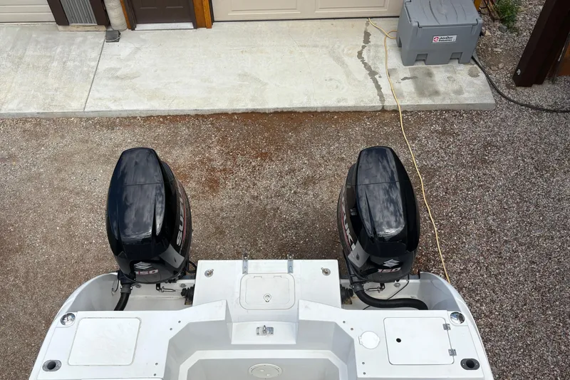 Slide: The Image of Top view of a 2001 Glacier Bay 2690 Coastal Runner with dual outboard motors. - 36