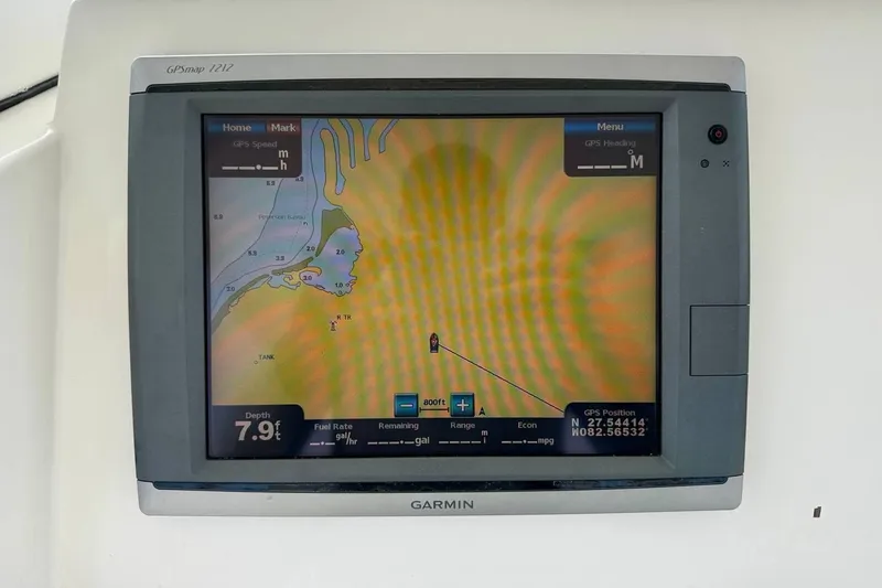 Slide: The Image of Garmin GPS display on 2014 Edgewater 280CC boat showing navigation map and depth. - 24