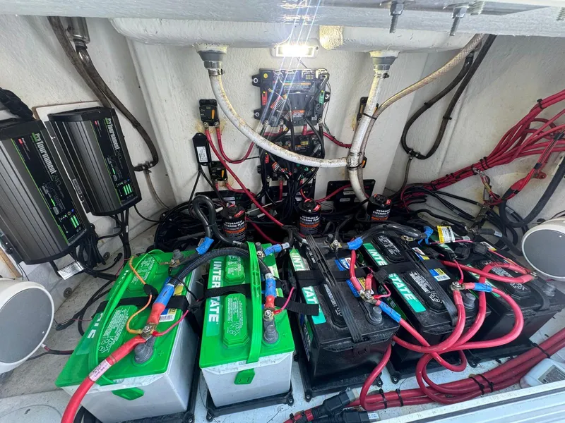 Slide: The Image of Electrical system of a 2020 Sportsman Open 352 Center Console boat with batteries and wiring. - 34
