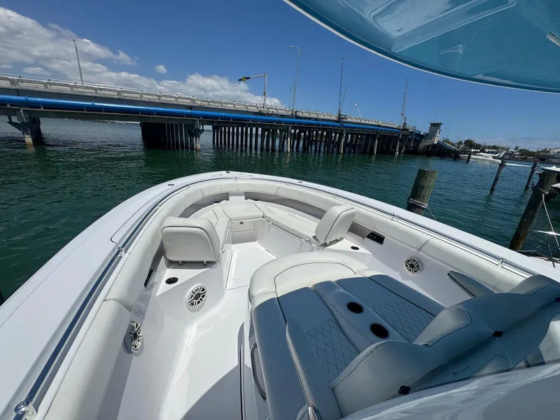 Slide: The Image of 2020 Sportsman Open 352 Center Console boat near a bridge on a sunny day. - 38