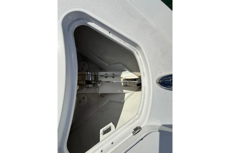 Slide: The Image of 2020 Sportsman Open 352 Center Console anchor compartment, showcasing storage and hardware details. - 46