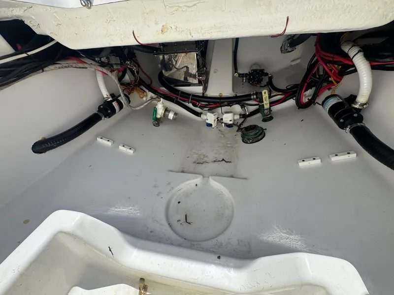 Slide: The Image of 2020 Sportsman Open 352 Center Console boat interior with cushioned seating and speaker. - 9