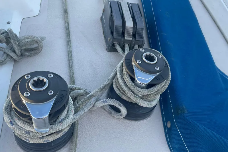 Slide: The Image of Sailboat winches and ropes on Newport 30-3, year 1987. - 24