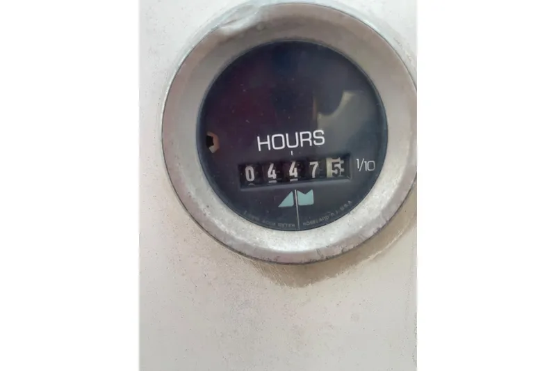 Slide: The Image of Hour meter reading 447.5 on 1987 Newport 30-3 boat. - 26