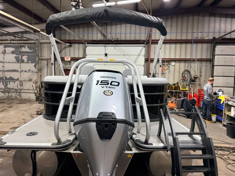 Slide: The Image of Bentley Pontoons 150HP Legacy 223 Navigator Quad Lounge Tritoon - $47995 2024 - 49