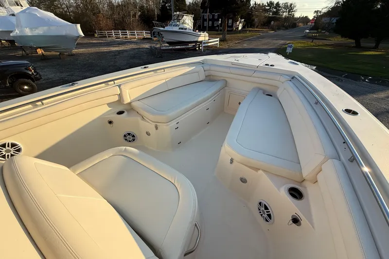 Slide: The Image of 2017 Grady-White Canyon 336 boat interior with spacious seating and cup holders. - 47