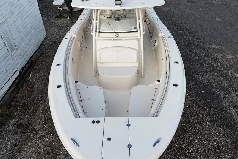Slide: The Image of 2017 Grady-White Canyon 336 boat, aerial view, showcasing spacious deck and seating. - 8