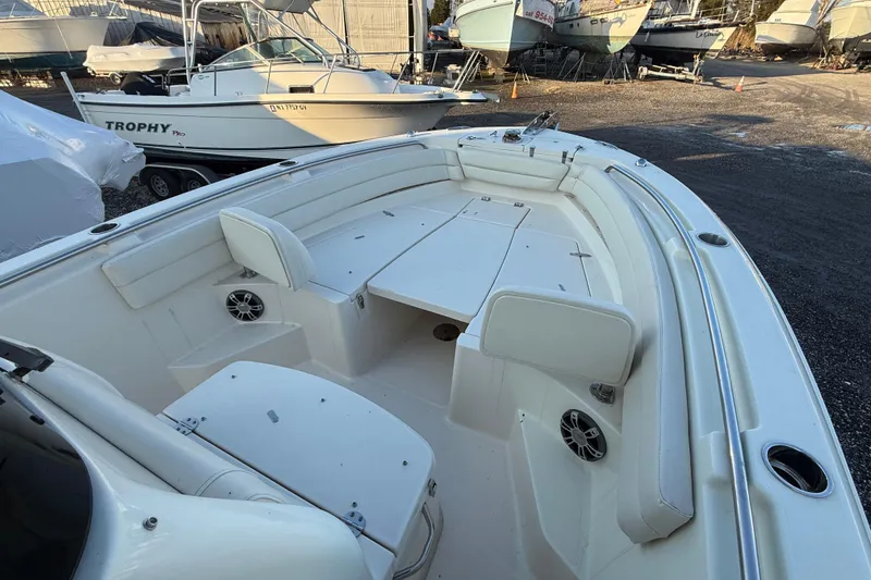 Slide: The Image of 2023 Grady-White Fisherman 236 boat interior with seating and storage. - 16