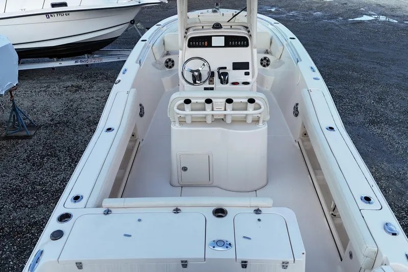 Slide: The Image of 2023 Grady-White Fisherman 236 boat interior with steering console and seating. - 6