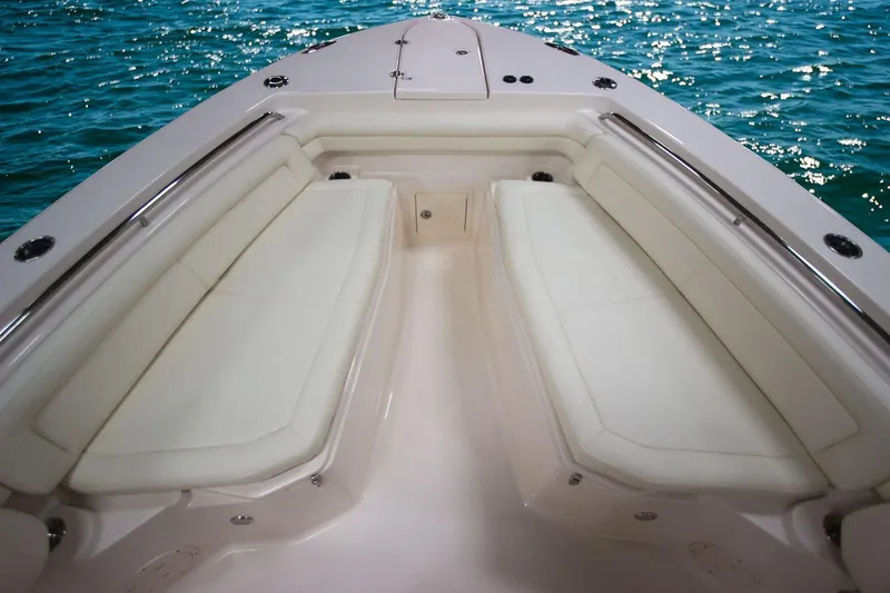 Slide: The Image of Manufacturer Provided Image: 2019 Grady-White Canyon 336 boat bow seating area on calm blue water. - 13