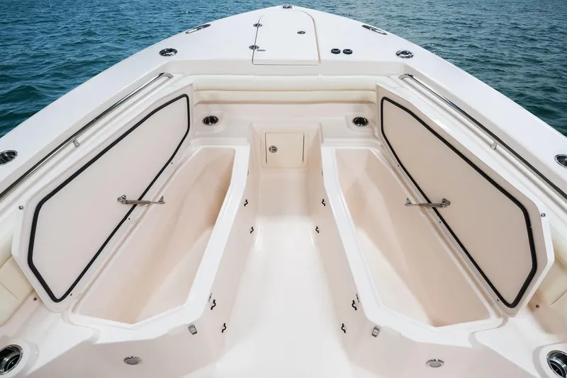 Slide: The Image of Manufacturer Provided Image: 2019 Grady-White Canyon 336 boat storage compartments open on deck. - 14