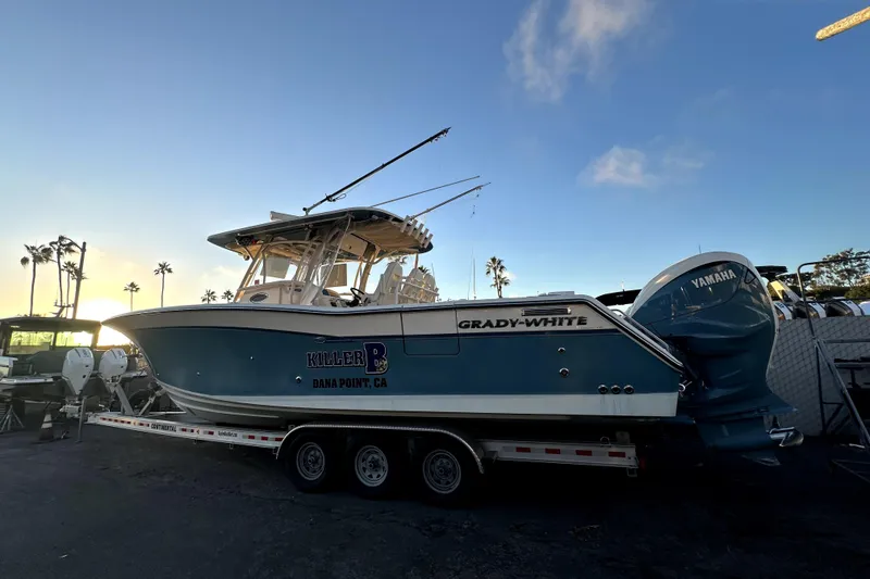 Slide: The Image of 2019 Grady-White Canyon 336 boat on trailer at sunset, Dana Point, CA. - 2