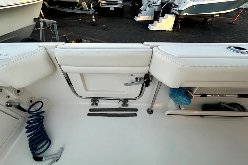 Slide: The Image of 2019 Grady-White Canyon 336 boat interior with seating and storage features. - 34