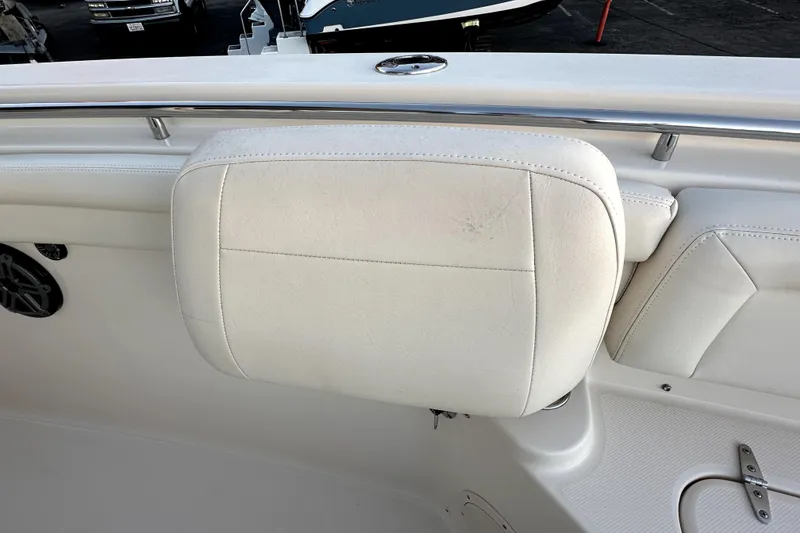 Slide: The Image of 2019 Grady-White Canyon 336 boat interior with white cushioned seating. - 45