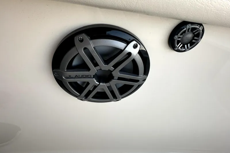 Slide: The Image of JL Audio speakers on 2019 Grady-White Canyon 336 boat interior. - 51