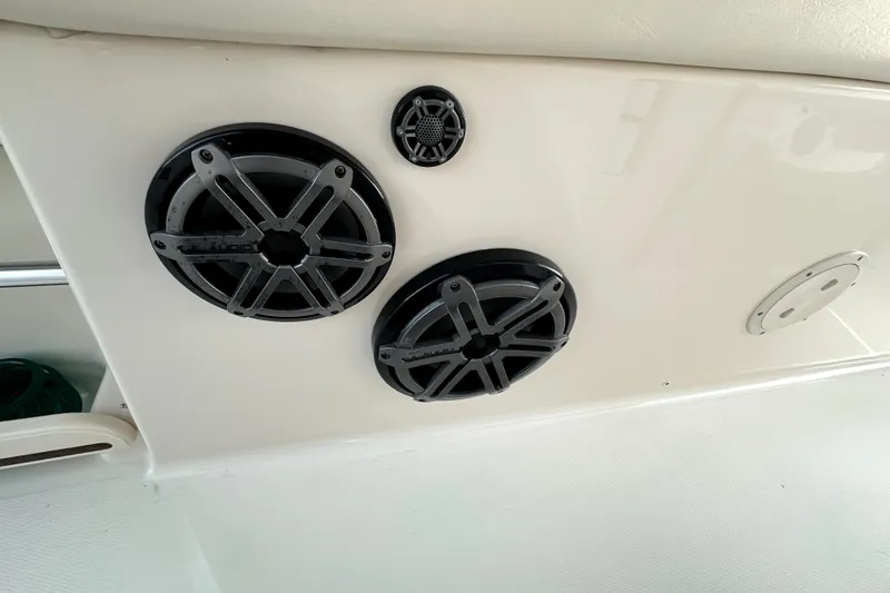 Slide: The Image of Speakers installed on a 2019 Grady-White Canyon 336 boat interior. - 53