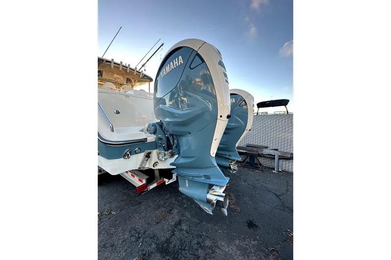 Slide: The Image of 2019 Grady-White Canyon 336 boat with twin Yamaha outboard engines. - 6
