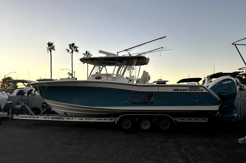 Slide: The Image of 2019 Grady-White Canyon 336 boat on trailer at sunset, Dana Point, CA. - 71