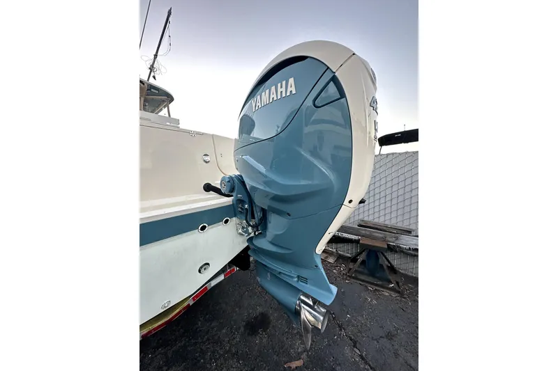 Slide: The Image of 2019 Grady-White Canyon 336 with Yamaha outboard motor, docked outdoors. - 75