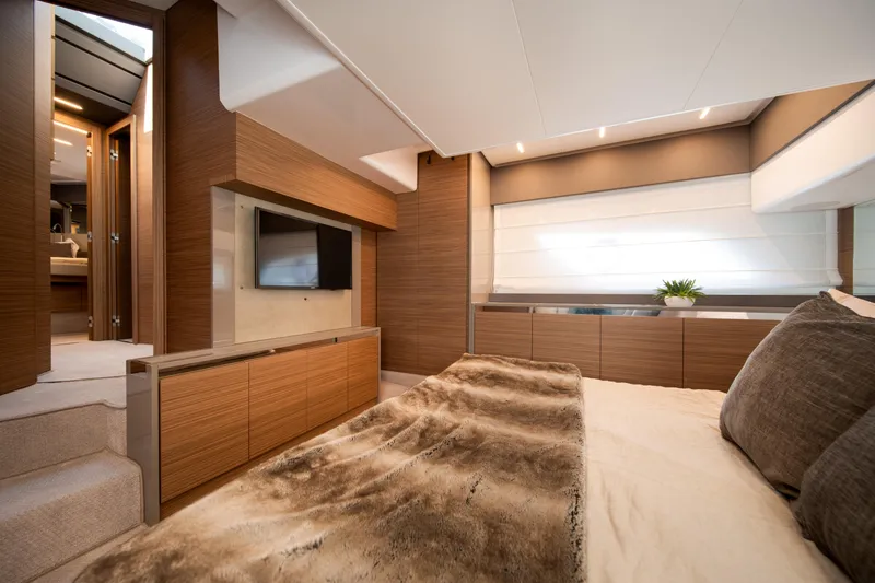 Slide: The Image of Luxurious interior of 2018 Ferretti Yachts 450 fly, featuring elegant wood finishes and modern design. - 20