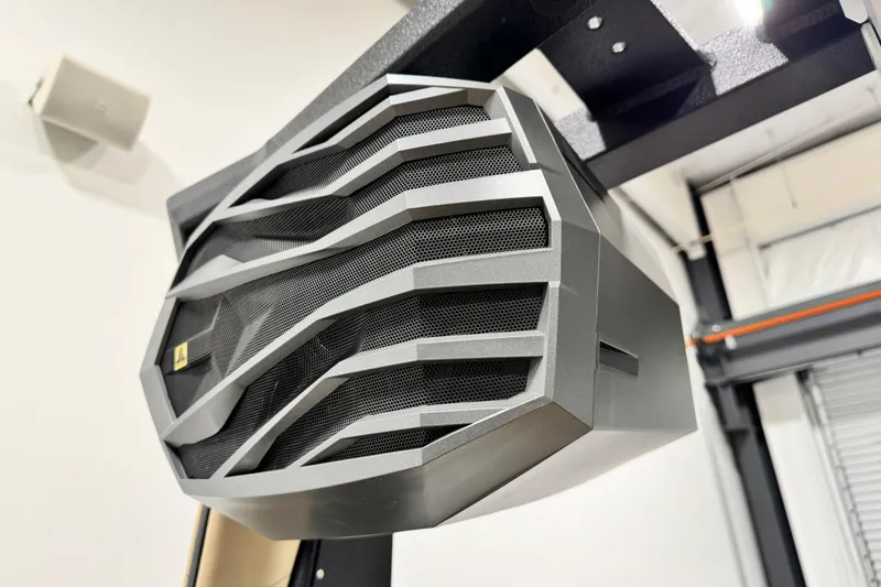 Slide: The Image of Close-up of a speaker on the 2025 Nautique Super Air Nautique G21 boat. - 18