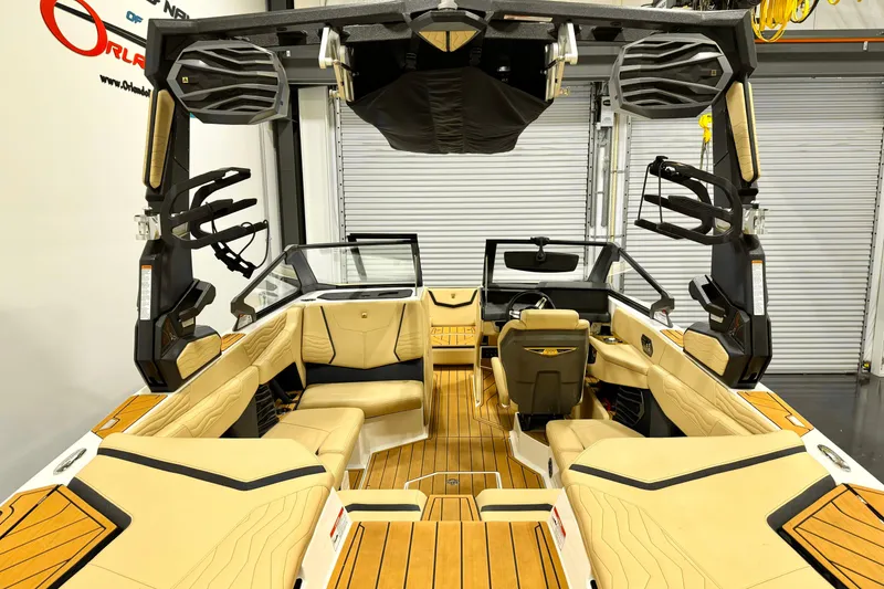 Slide: The Image of 2025 Nautique Super Air Nautique G21 interior with luxurious seating and advanced features. - 6