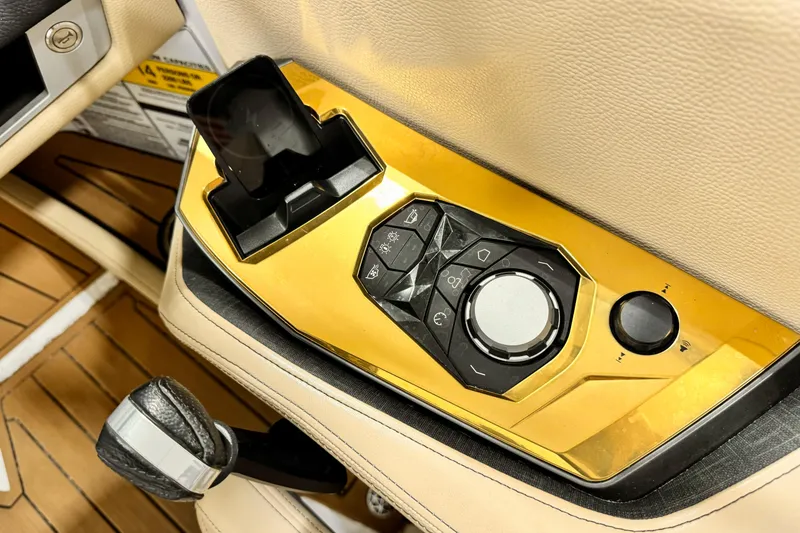 Slide: The Image of Control panel of 2025 Nautique Super Air Nautique G21 boat, featuring sleek design and modern controls. - 9