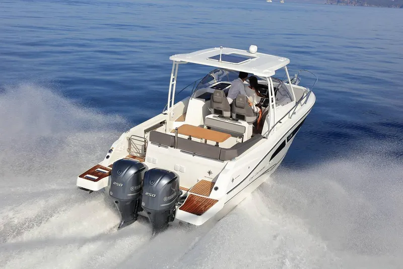 Slide: The Image of 2024 Jeanneau Leader 9.0 WA boat interior with kitchenette and modern amenities. - 7