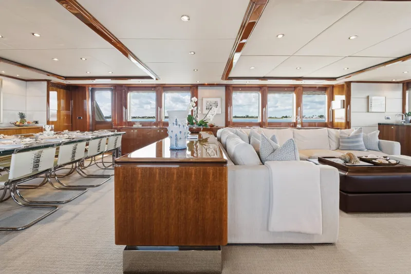 Slide: The Image of Luxurious interior of 1990 Delta Expedition yacht with elegant dining and seating areas. - 13