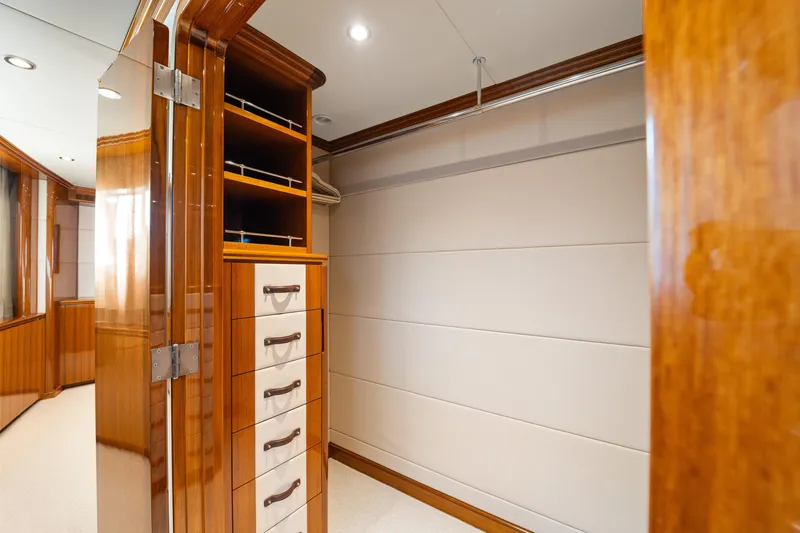 Slide: The Image of Luxurious wooden interior of 1990 Delta Expedition yacht with drawers and shelves. - 22