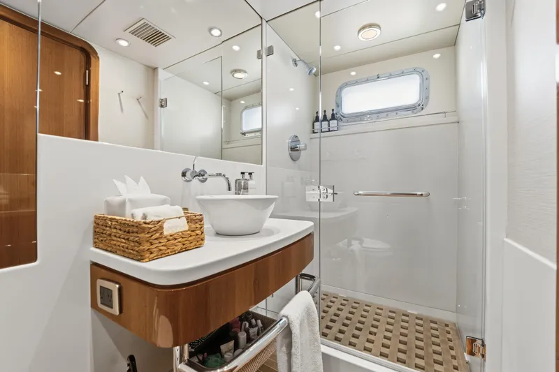 Slide: The Image of Luxurious 1990 Delta Expedition yacht bathroom with modern fixtures and elegant design. - 25
