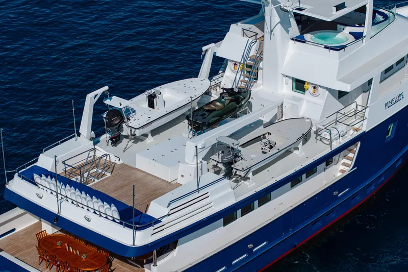 Slide: The Image of Aerial view of 1990 Delta Expedition yacht with deck and watercraft. - 3