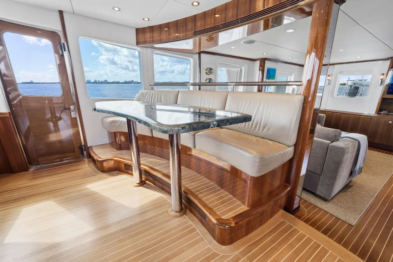 Slide: The Image of Luxurious 1990 Delta Expedition yacht interior with elegant wood finishes and ocean view. - 34