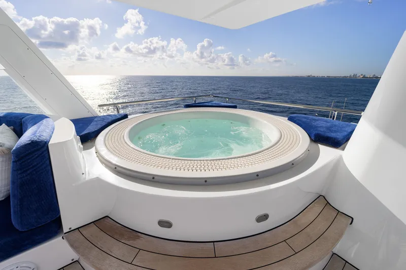 Slide: The Image of Luxurious yacht deck with hot tub, ocean view, Delta Expedition 1990 model. - 42