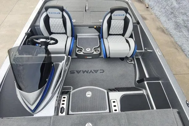 Slide: The Image of 2026 Caymas CX20 Pro boat interior with dual seats and steering console. - 5