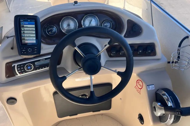 Slide: The Image of Steering console of 2017 Fiesta 22 Beachcomber boat with navigation equipment. - 10