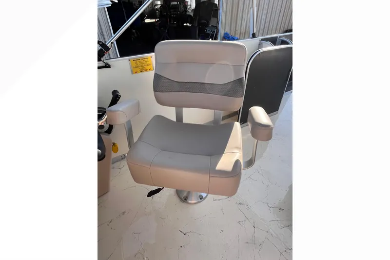 Slide: The Image of Captain's chair on 2017 Fiesta 22 BEACHCOMBER boat, featuring comfortable armrests and modern design. - 19