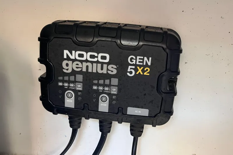 Slide: The Image of NOCO Genius GEN 5X2 battery charger on 2017 Fiesta 22 Beachcomber boat. - 22