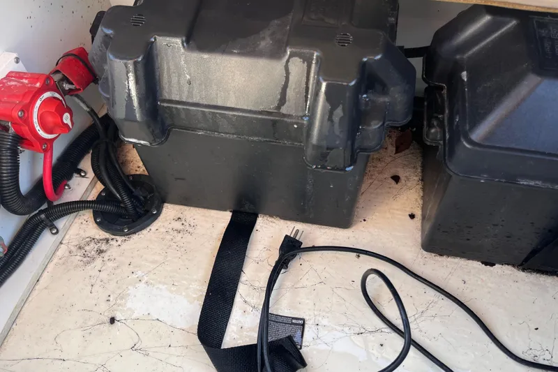 Slide: The Image of Battery compartment of a 2017 Fiesta 22 Beachcomber boat with wiring and connectors. - 23
