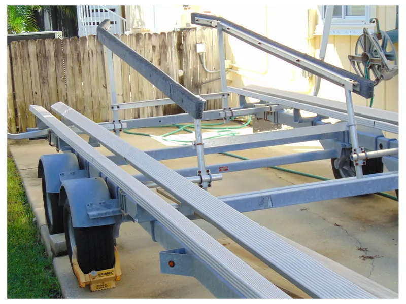 Slide: The Image of Trailer for 2017 Fiesta 22 Beachcomber boat, parked on concrete driveway. - 25