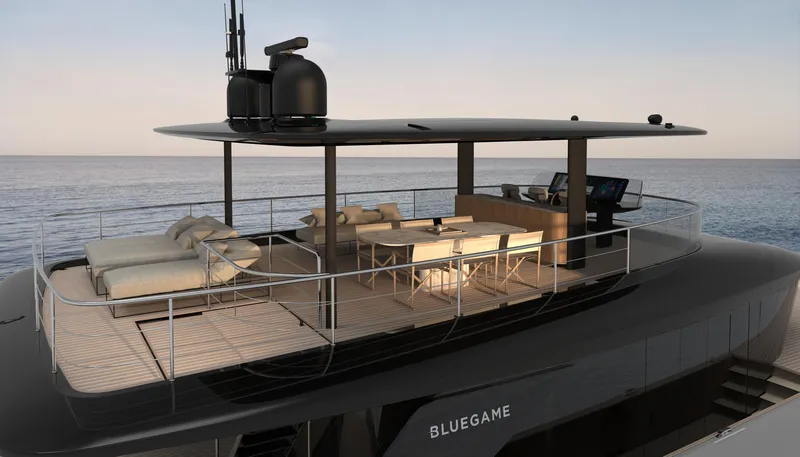Slide: The Image of 2025 Bluegame BGM75 yacht cruising on calm ocean waters. - 1