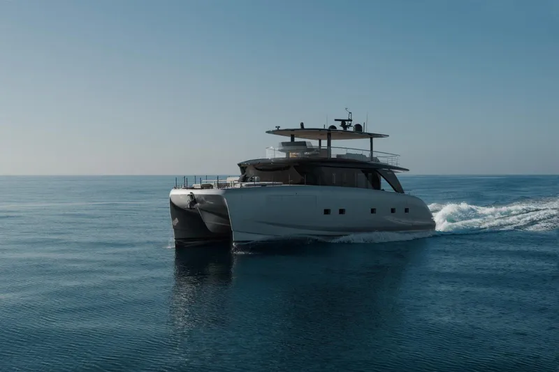 Slide: The Image of 2025 Bluegame BGM75 yacht cruising on calm ocean waters. - 25