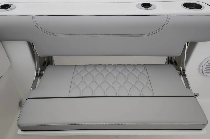 Slide: The Image of 2026 Pursuit DC 266 Dual Console boat seat with elegant diamond stitching. - 24