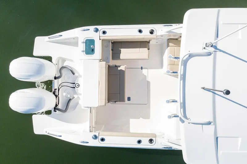 Slide: The Image of Manufacturer Provided Image: Top view of 2025 Pursuit DC 266 Dual Console boat with twin engines. - 42