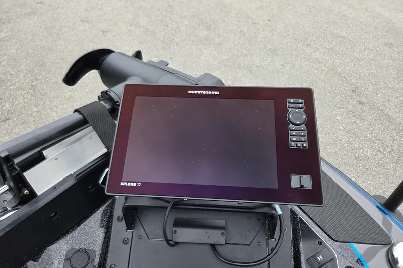 Slide: The Image of Humminbird Xplore 12 fishfinder on 2026 Skeeter FXR21 Apex boat dashboard. - 12
