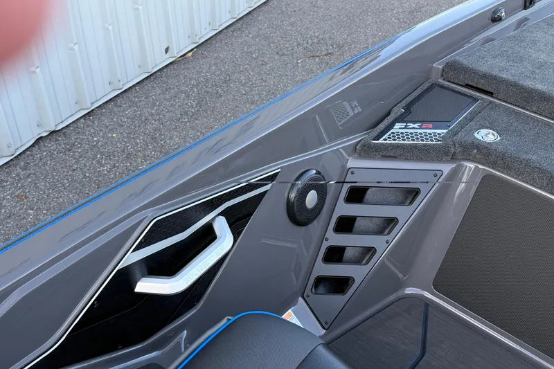 Slide: The Image of 2026 Skeeter FXR21 Apex boat interior with sleek design and modern features. - 14