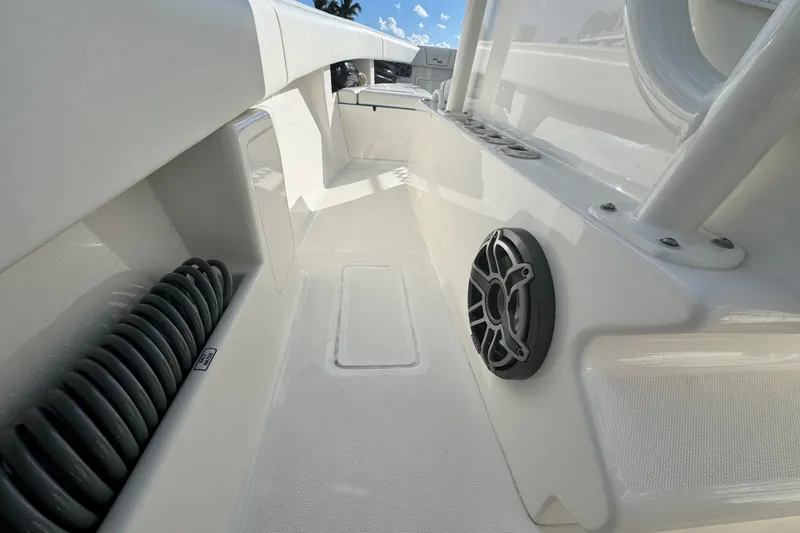 Slide: The Image of 2024 SeaVee 290B boat interior with speaker and coiled hose detail. - 21