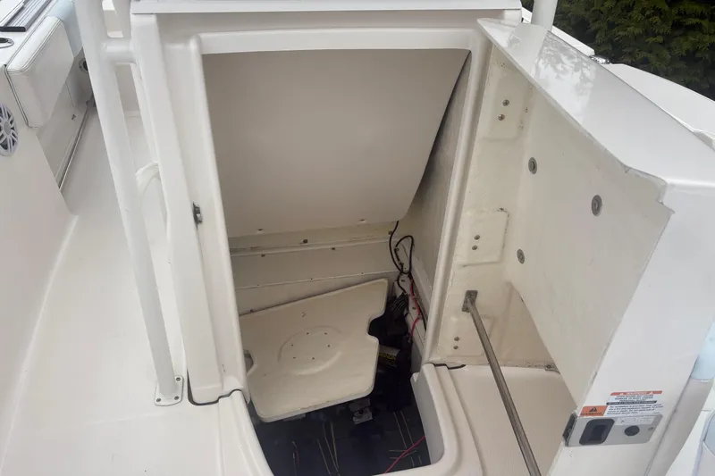Slide: The Image of 2021 Robalo R202 Explorer boat storage compartment interior view. - 11