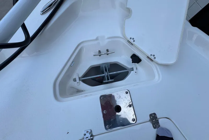 Slide: The Image of Anchor compartment of 2026 Key West 230 Bay Reef boat, open hatch view. - 23