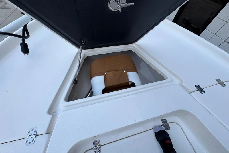 Slide: The Image of Open storage compartment on 2026 Key West 230 Bay Reef boat deck. - 24